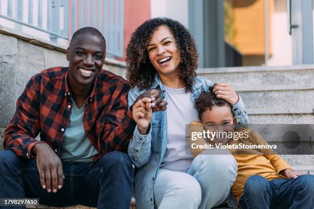 Happy Family with New Home Keys